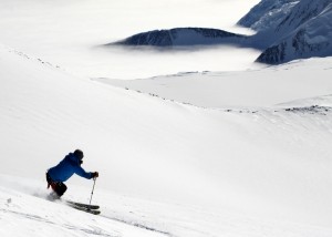 Chase skiing down the ridge