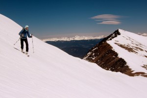 Kristine skiing the really fun east face of Crystal Peak