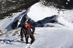 Mike loving being high on a 13er in winter-like conditions