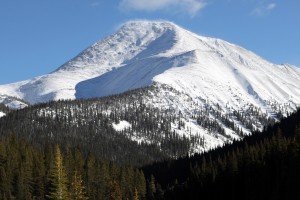Mt. Guyot from the north on the French Creek Road with the northwest ridge in profile. The plumes of snow can be seen on the summit ridge as a result of the strong winds
