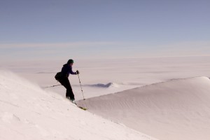 Kristine skiing the ridge down Ski Hill