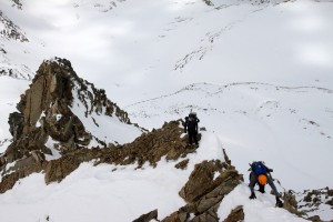 Climbing the west ridge with the top of the large tower below to the left