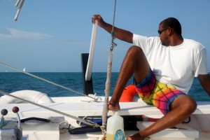 Captain Ian setting the sails and taking us home after a great day of snorkeing