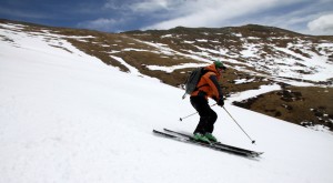 J laughing and skiing