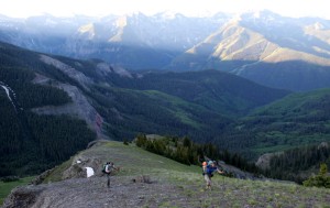 Jim & Kelly making their way up the grassy rib after leaving the Sneffels Highline trail