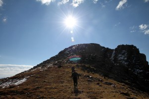 Descending off of Point 13,091' in the morning sun