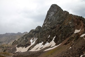 Peak C's  snowy north face from below the east side of Kneeknocker Pass