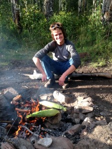 Me and our dinner roasting over the campfire