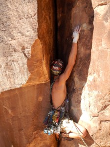 Me beginning the lead of 100' Hands (5.10a/b)