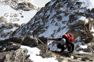 Kristine climbing the initial class 3 portion of the east ridge