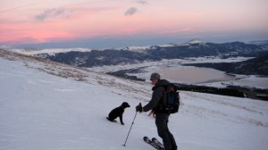 Kona & myself skiing down the east ridge at dusk