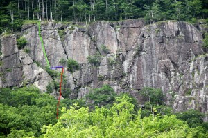Route outline of Charlotte's Crack as seen from Barrett's Cove: red is 1st pitch, blue is Broadway, & green is 2nd pitch