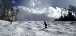 Logan skiing down the black diamond named Wapiti at Arrowhead