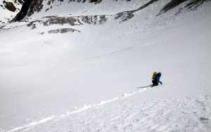 Natalie striking out across the slope below the small cliff band. This would have been a fun ski with good snow :)