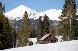 The Harry Gates Hut with the south face of Fools Peak (12,947') behind