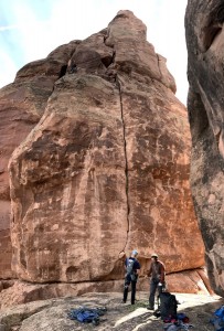 Scoping out the 1st pitch - a 5.10 handcrack with a 5.10+ crux off the ground to get into the hand crack