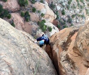 Dylan climbing pitch 2 of Fast Draw